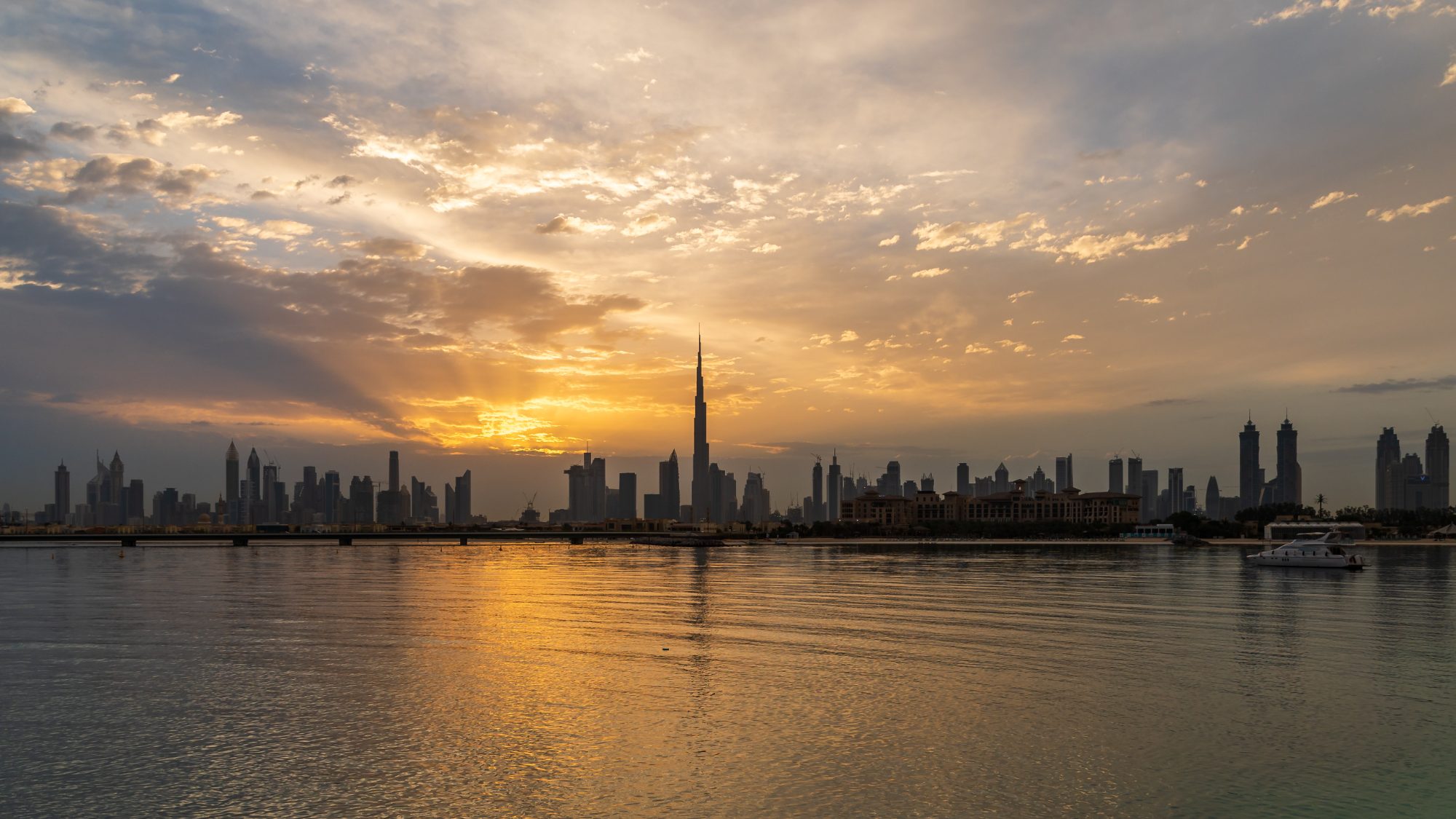Dubai skyline at dusk across the water